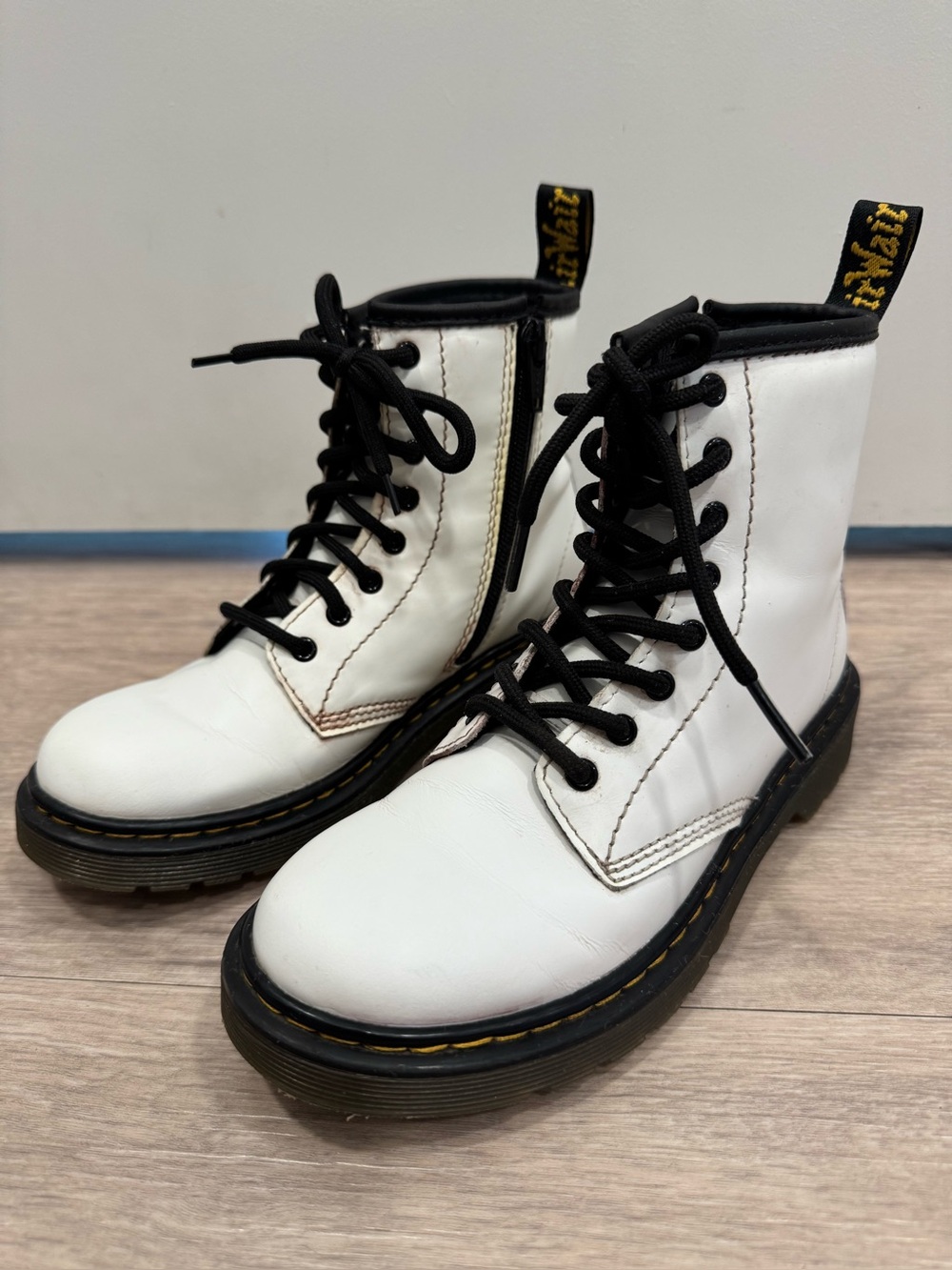 Dr. Martens White Leather Lace-Up Combat Boots with Black Trim